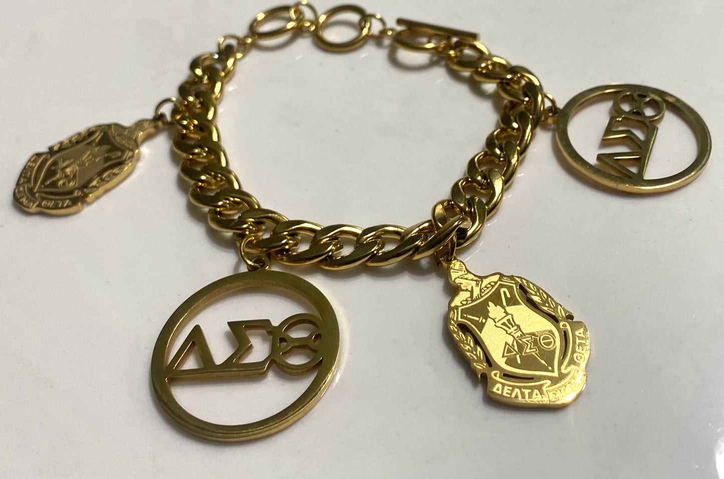 Delta Sigma Theta- Multi Pendant stainless steel bracelet- GOLD